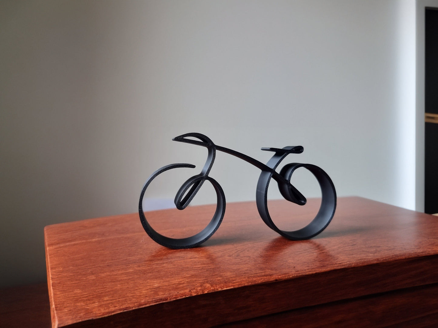 Elegant minimalist bicycle sculpture wireframe style